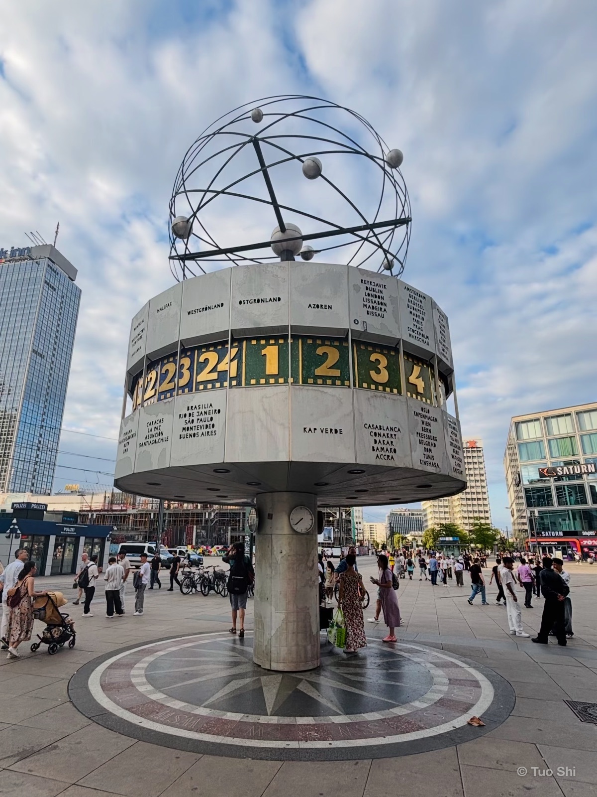 The World Clock on Alexanderplatz with its rotating city panels and atom-like sculpture on top